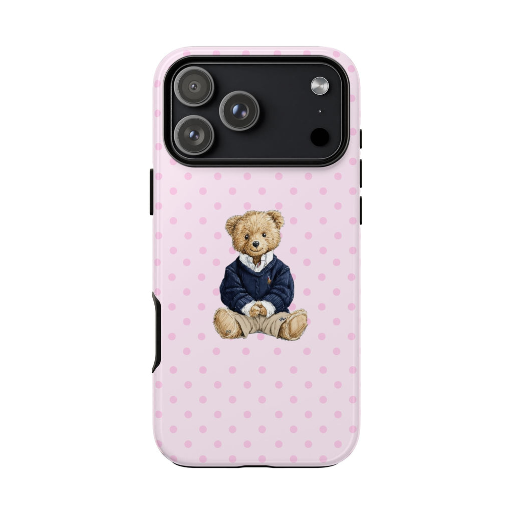 Pink polka dot phone case with cute teddy bear wearing a navy outfit