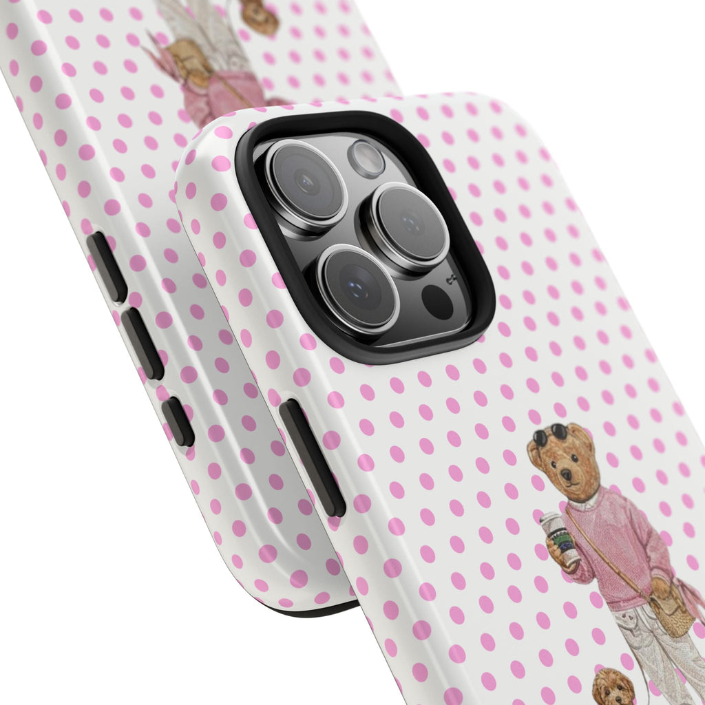 Pink polka dot phone case with teddy-bear puppy design, side buttons visible