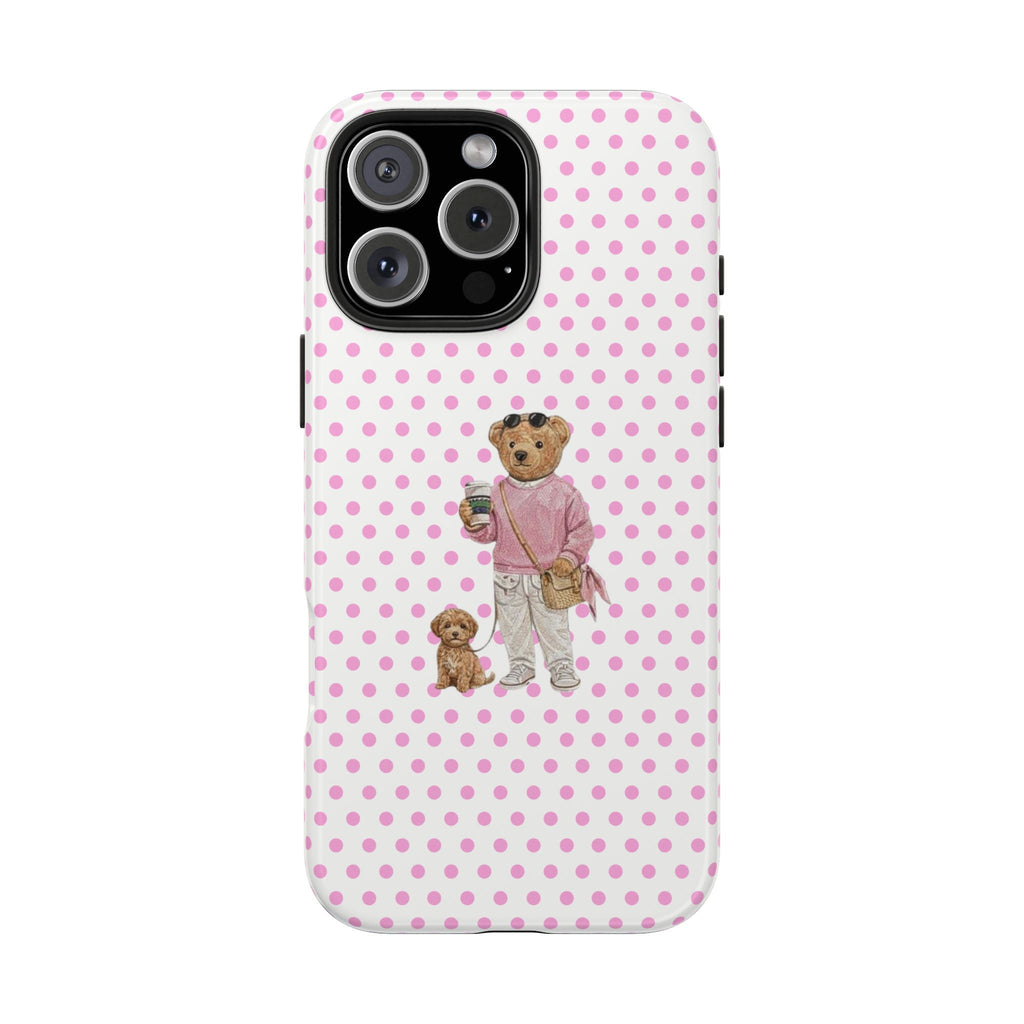 Pink polka dot phone case with teddy-bear puppy figure on back
