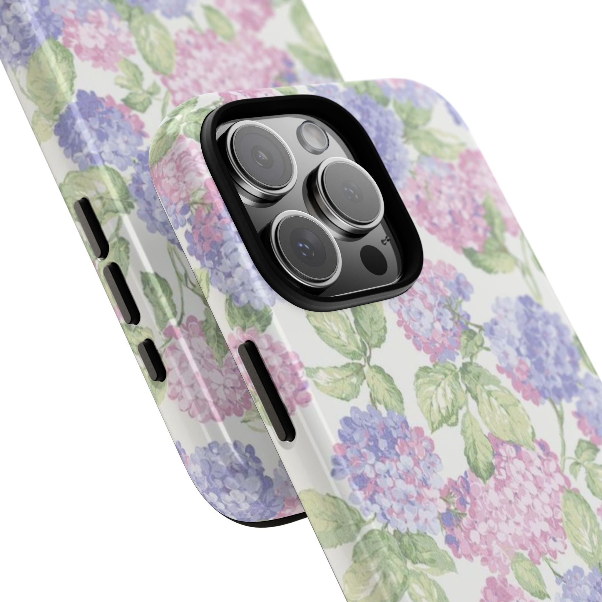 Hydrangea floral phone case in pink, purple, and green; side buttons and camera cutout