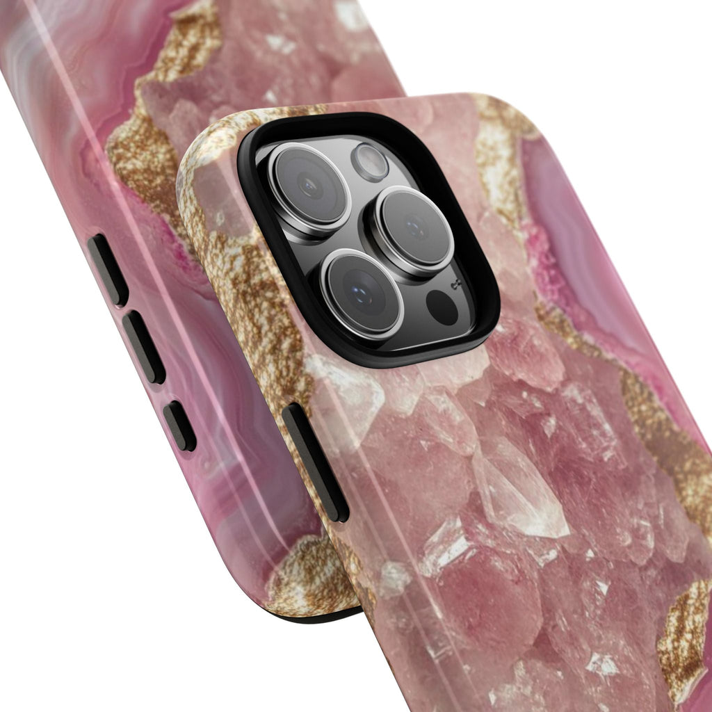 Pink quartz phone case with gold edges, showing dual-camera cutout on black panel
