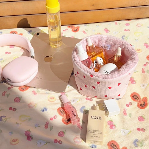 Pink red-hearts organizer pouch with open center for holding beauty bottles and sprays
