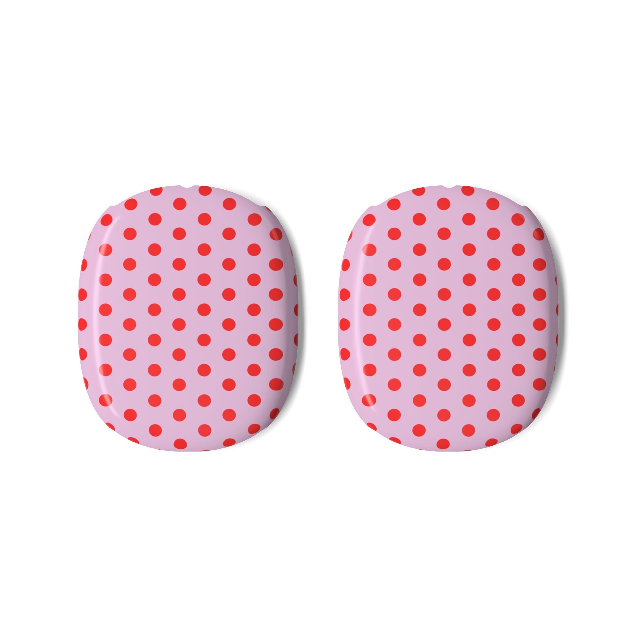 Pair of AirPods Max ear cup covers, pink with red polka dot pattern, rounded