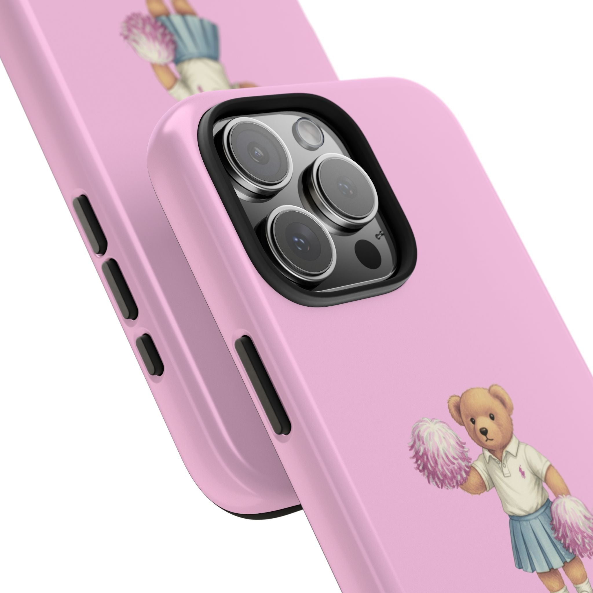 Close-up pink phone case with teddy cheerleader print and side button cutouts