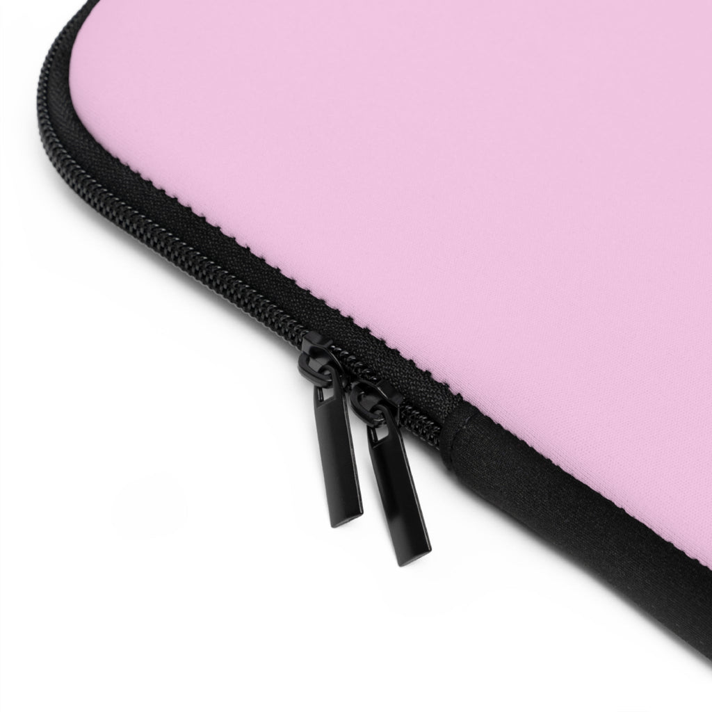 Black zipper detail on pink neoprene sleeve edge with stitched border