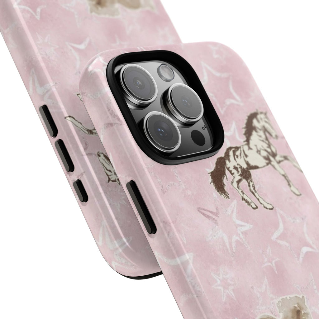 Pink phone case close-up with white stars, brown horse art, raised camera lens ring