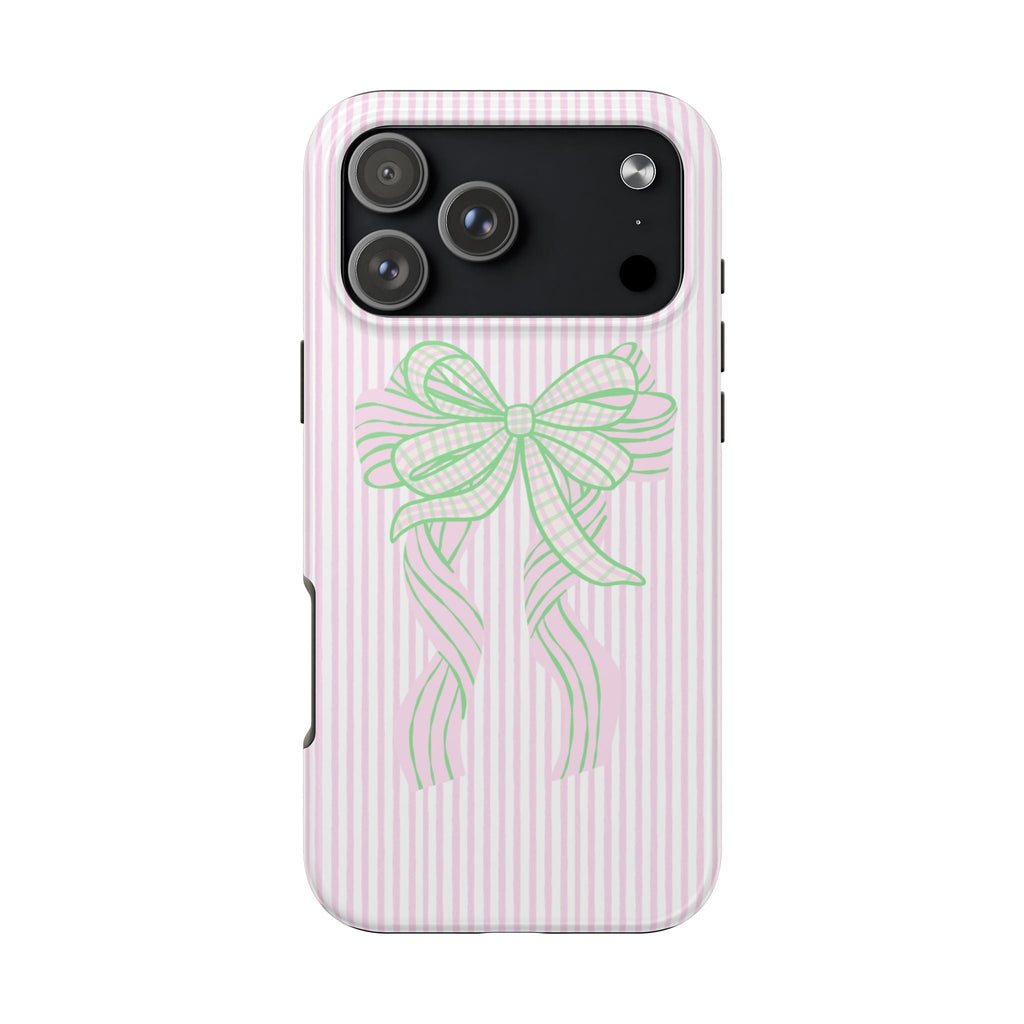 Pink striped phone case with green bow, raised camera cutout