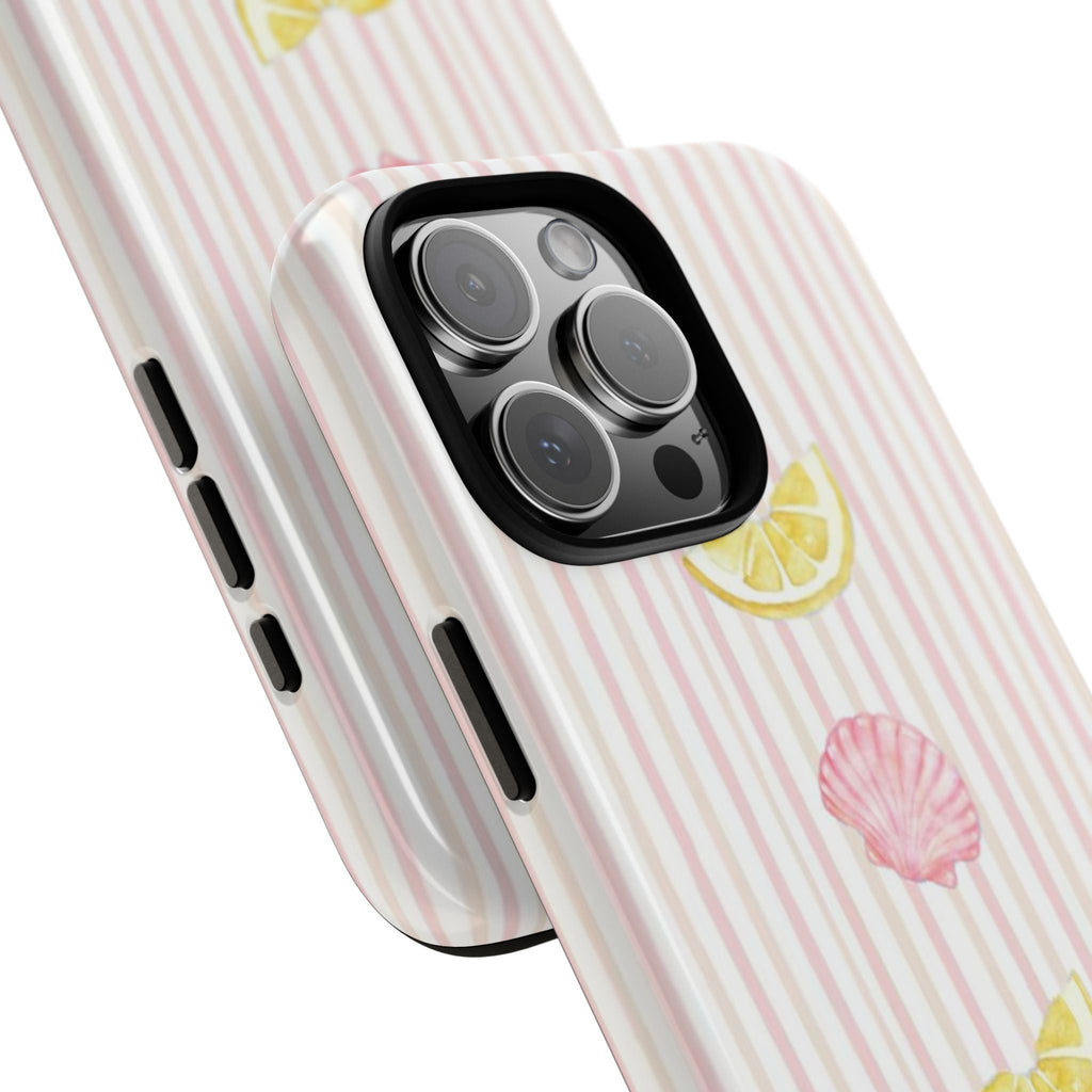 Angled view of pink-and-white striped phone case with lemons and pink shells
