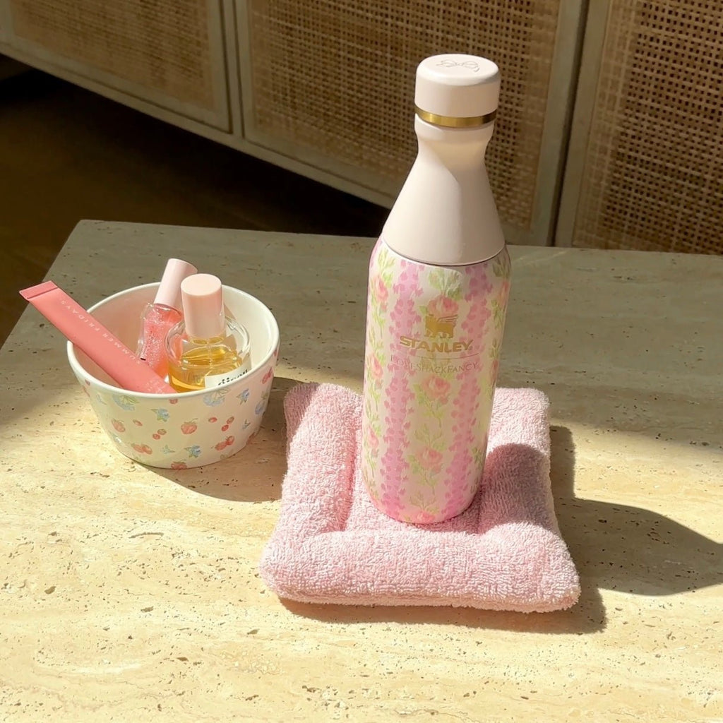 Pink cloud-shaped terry coaster, plush textured surface for drinks