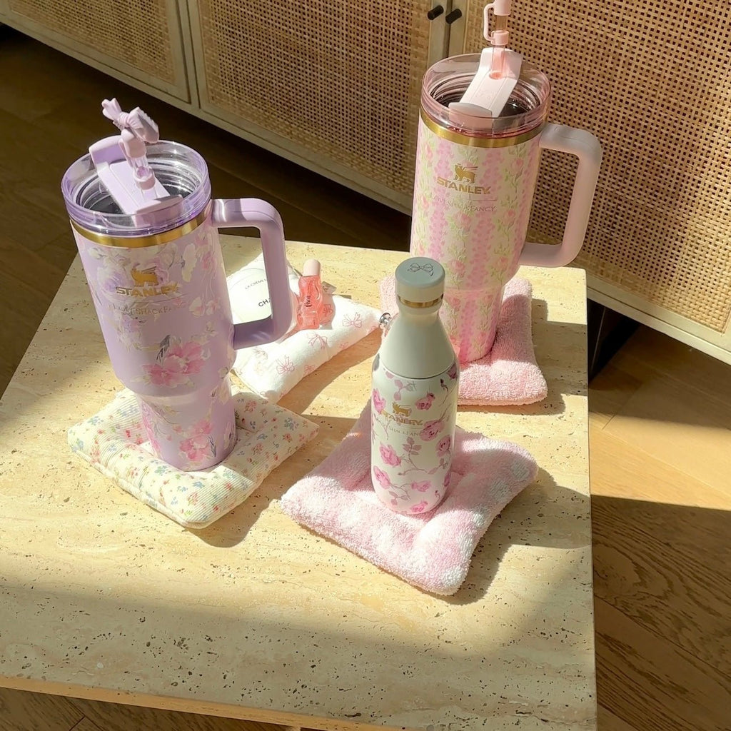 Pink plush cloud coaster with terry texture, laid flat on countertop