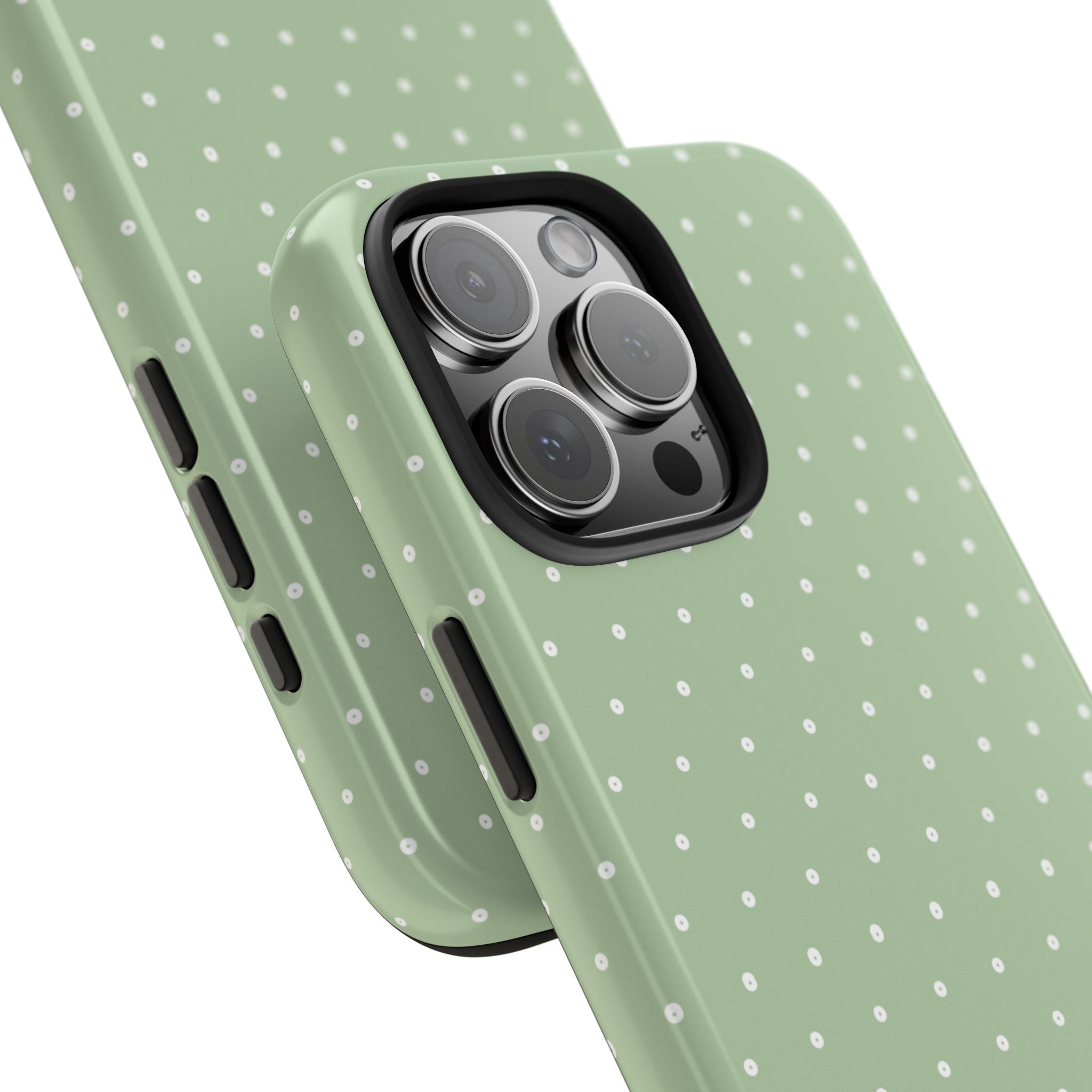 Pistachio green polka dot case, angled view showing side buttons and lens cutout