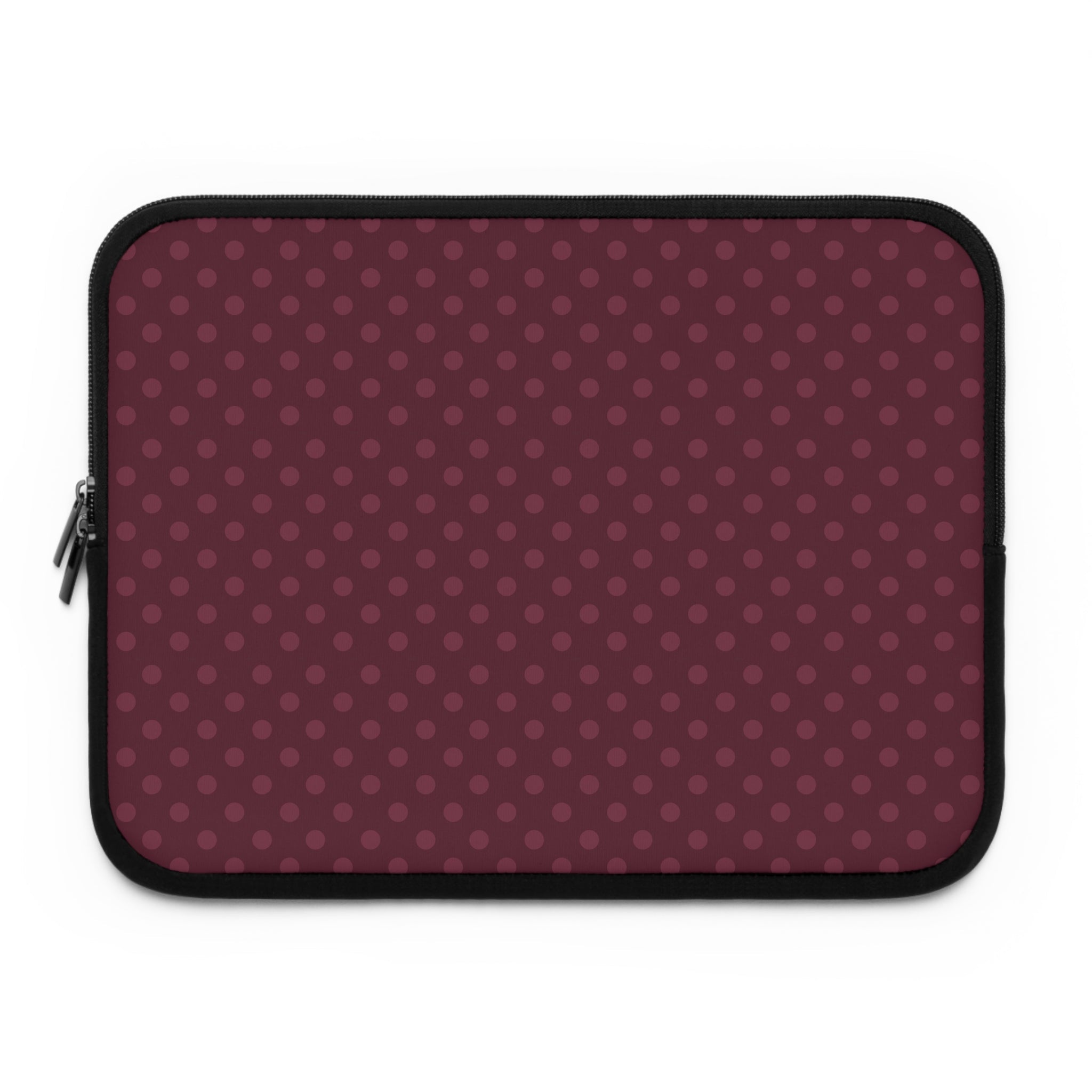 Plum polka-dot neoprene sleeve with black zipper trim.