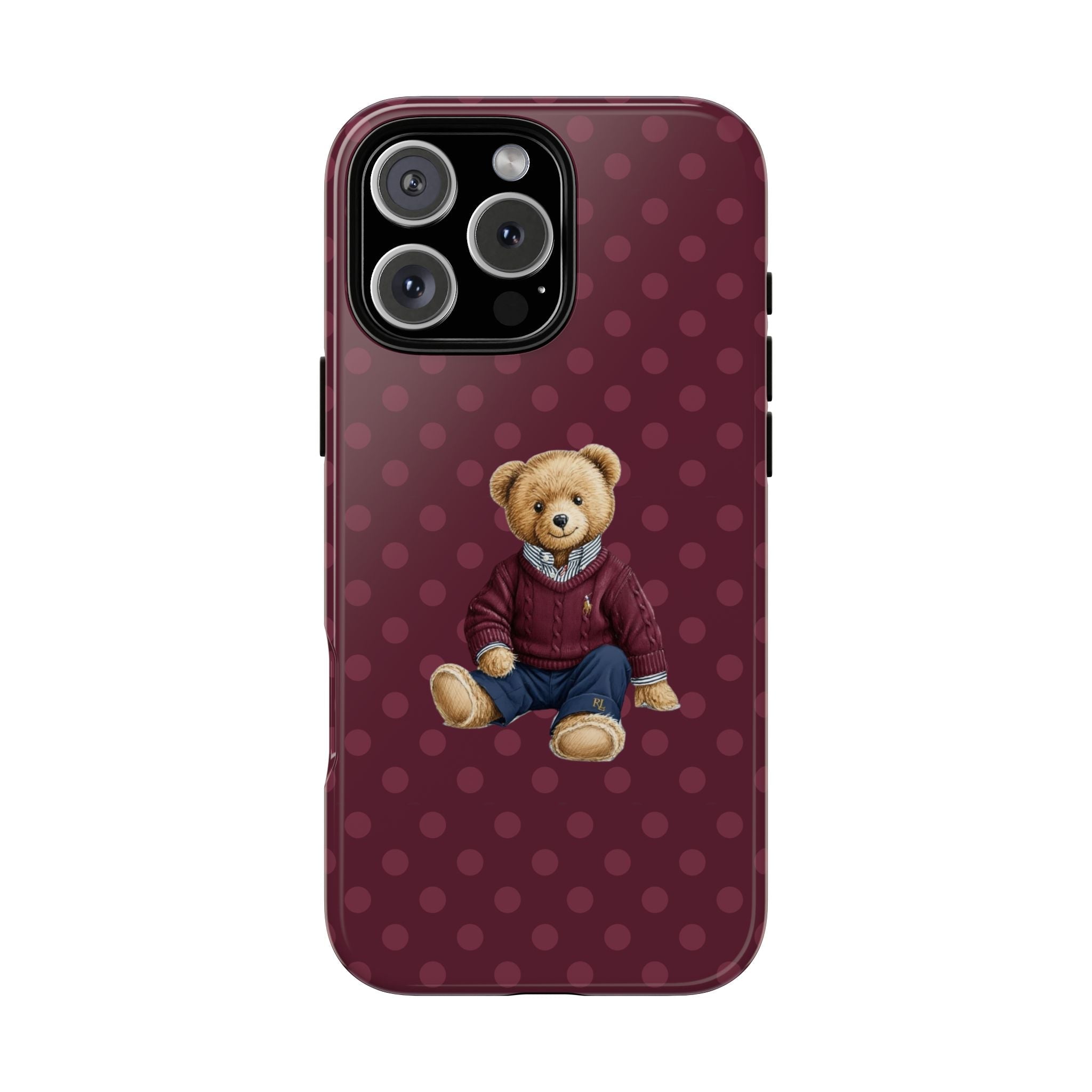 Plum polka dot phone case with seated teddy bear graphic and camera cutout