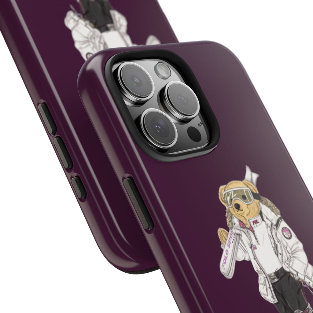 Plum phone case close-up with side buttons and astronaut teddy bear design