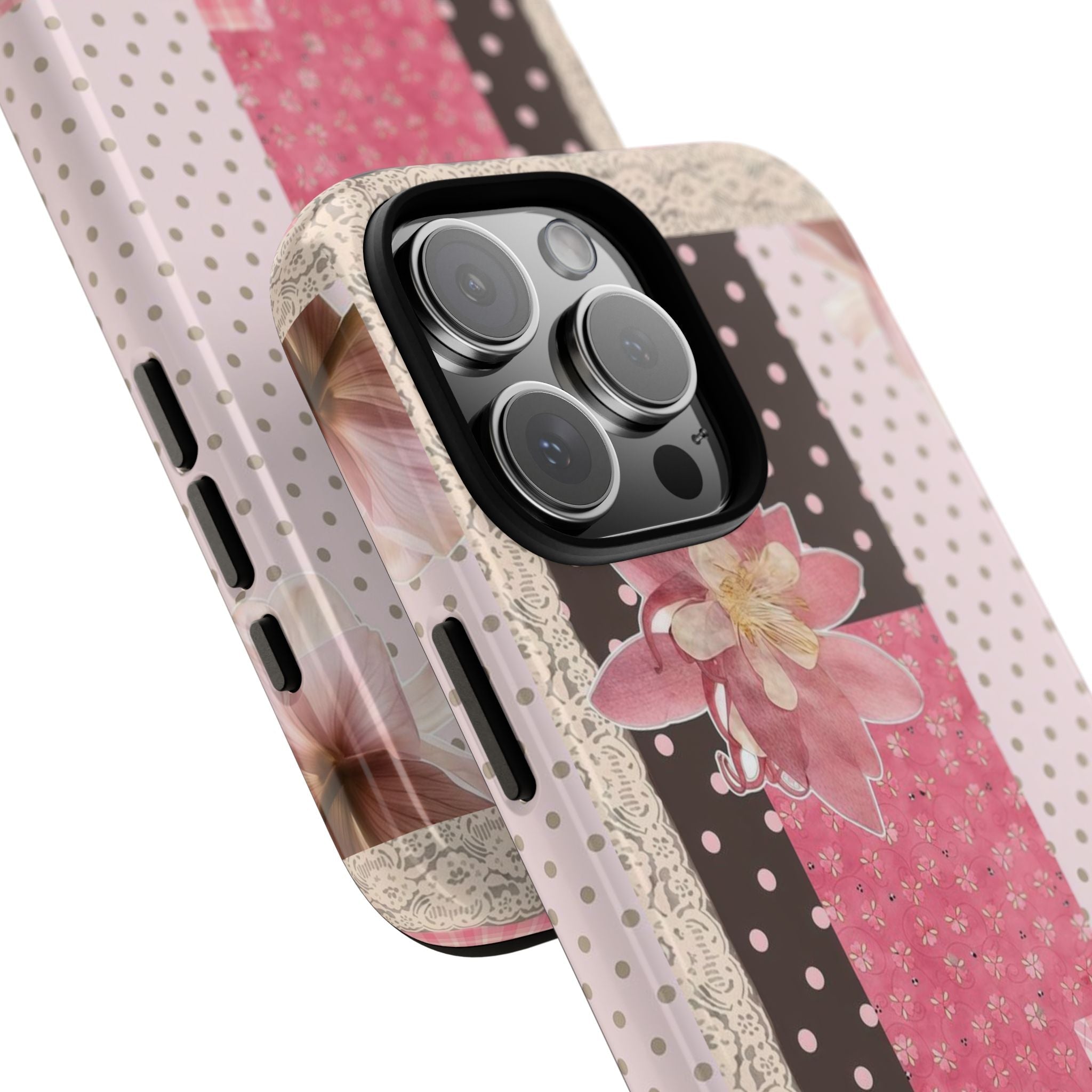 Angled view of pink polka dot floral patchwork phone case with camera cutouts