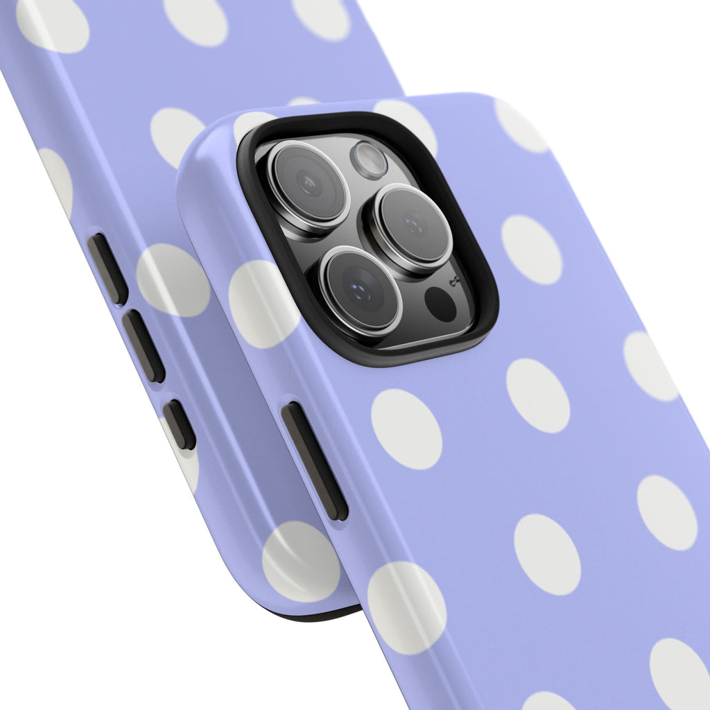 Close-up of light purple phone case with white polka dots near camera lenses