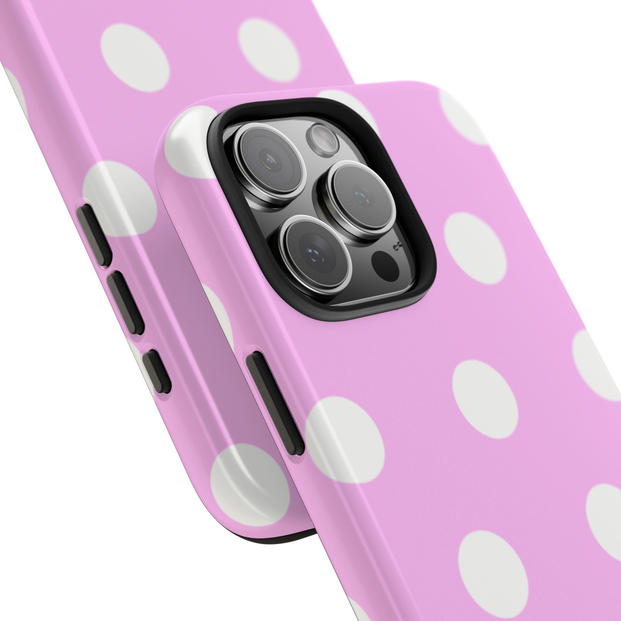 Pink polka-dot phone case close-up with camera cutouts
