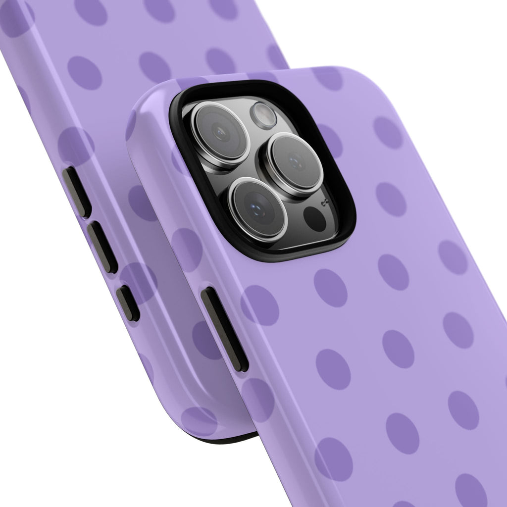 Close-up of purple polka dot phone case with protective raised camera rings