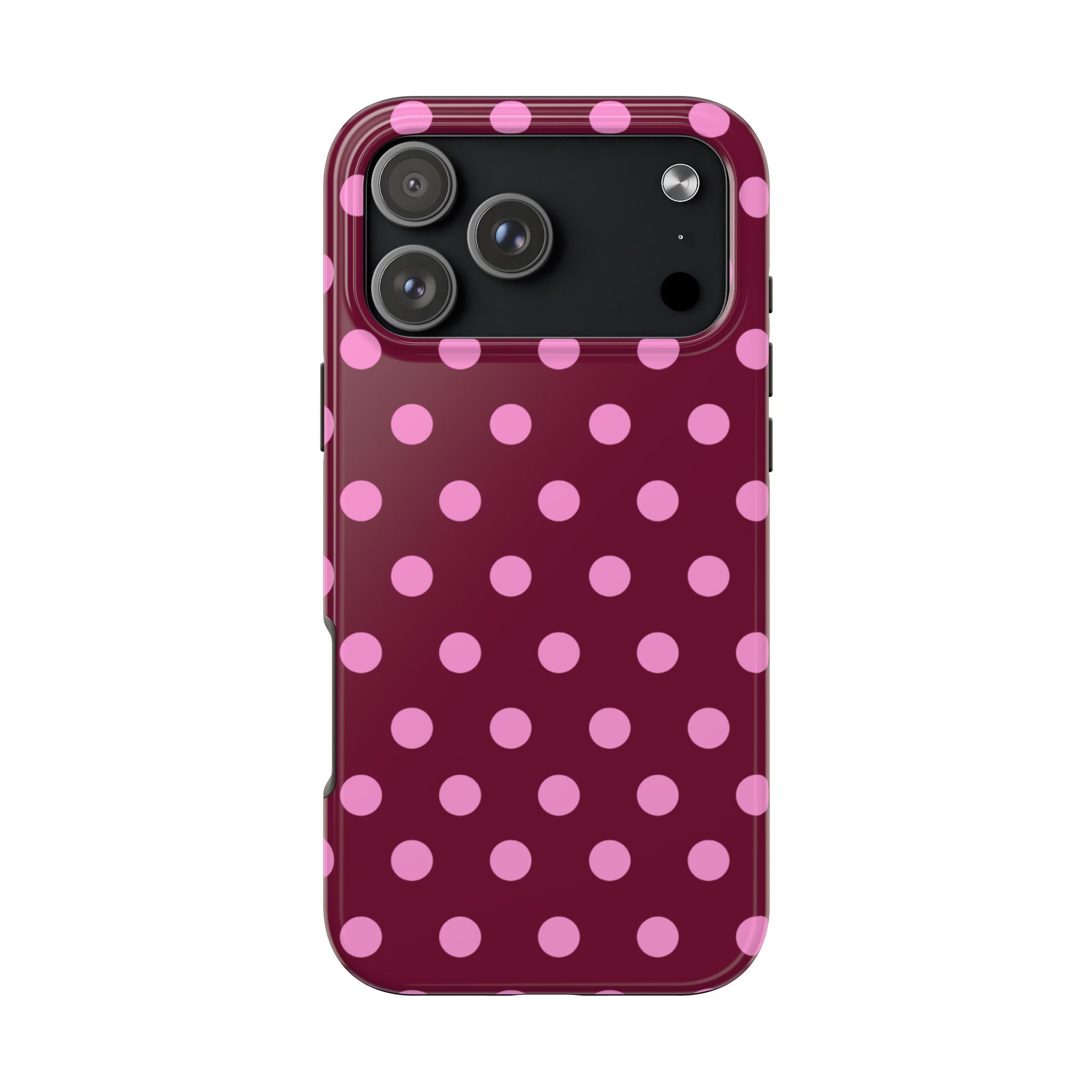 Raspberry pink polka dot phone case with camera opening and side button cutouts