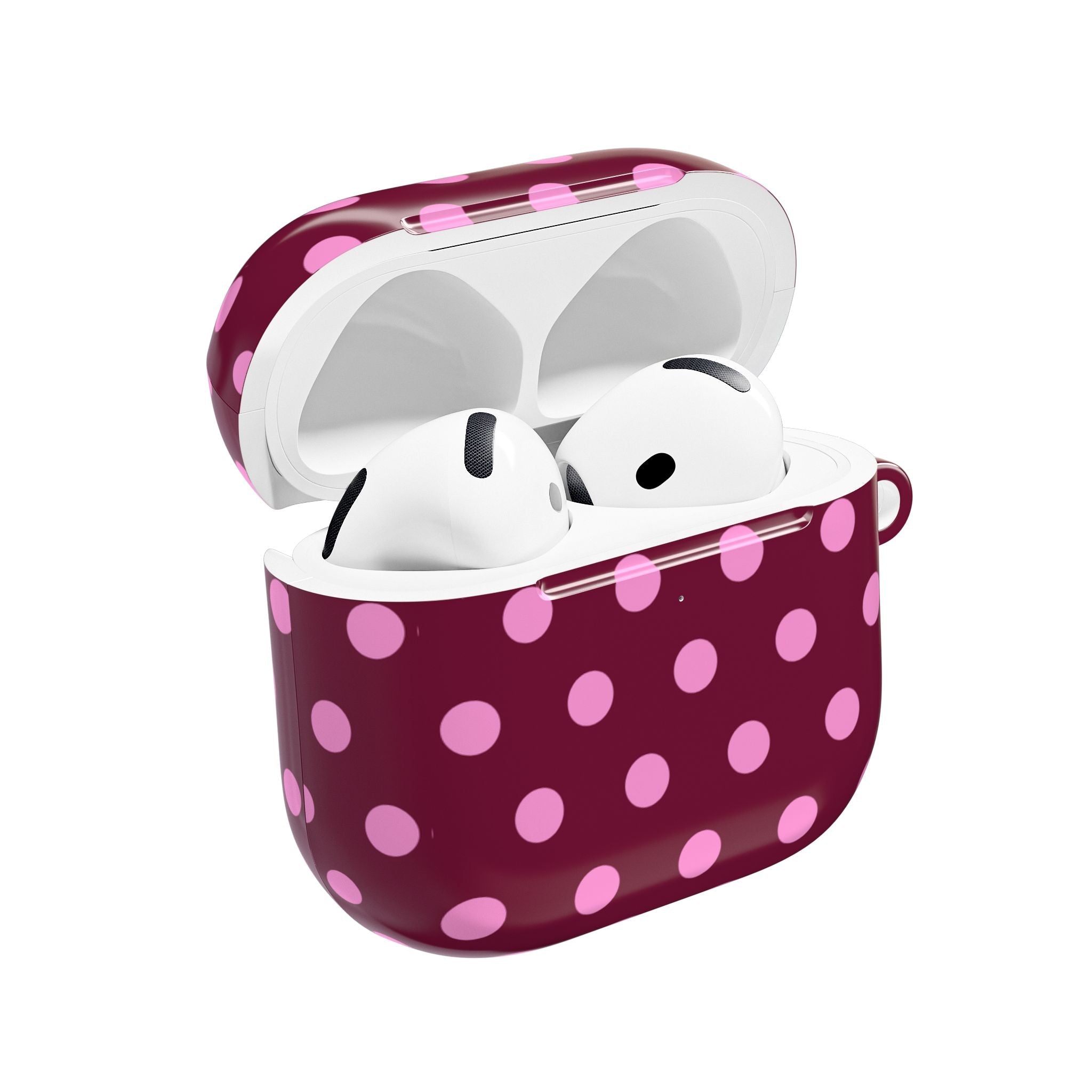 Maroon AirPods case with pink polka dots, open top showing white earbuds