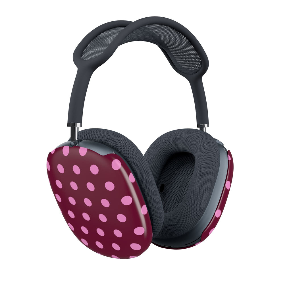AirPods Max ear cup cover, raspberry with pink polka dots, over dark pads.
