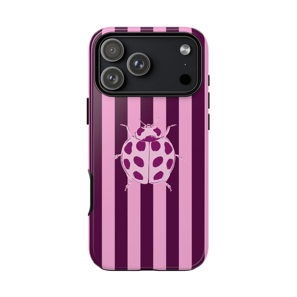 Raspberry and dark purple striped phone case with ladybug illustration and back cameras