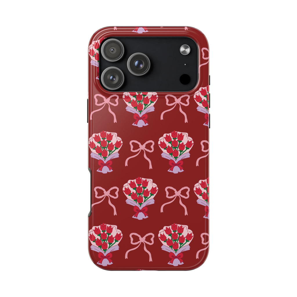 Red phone case back with repeating bouquets and ribbon bow pattern