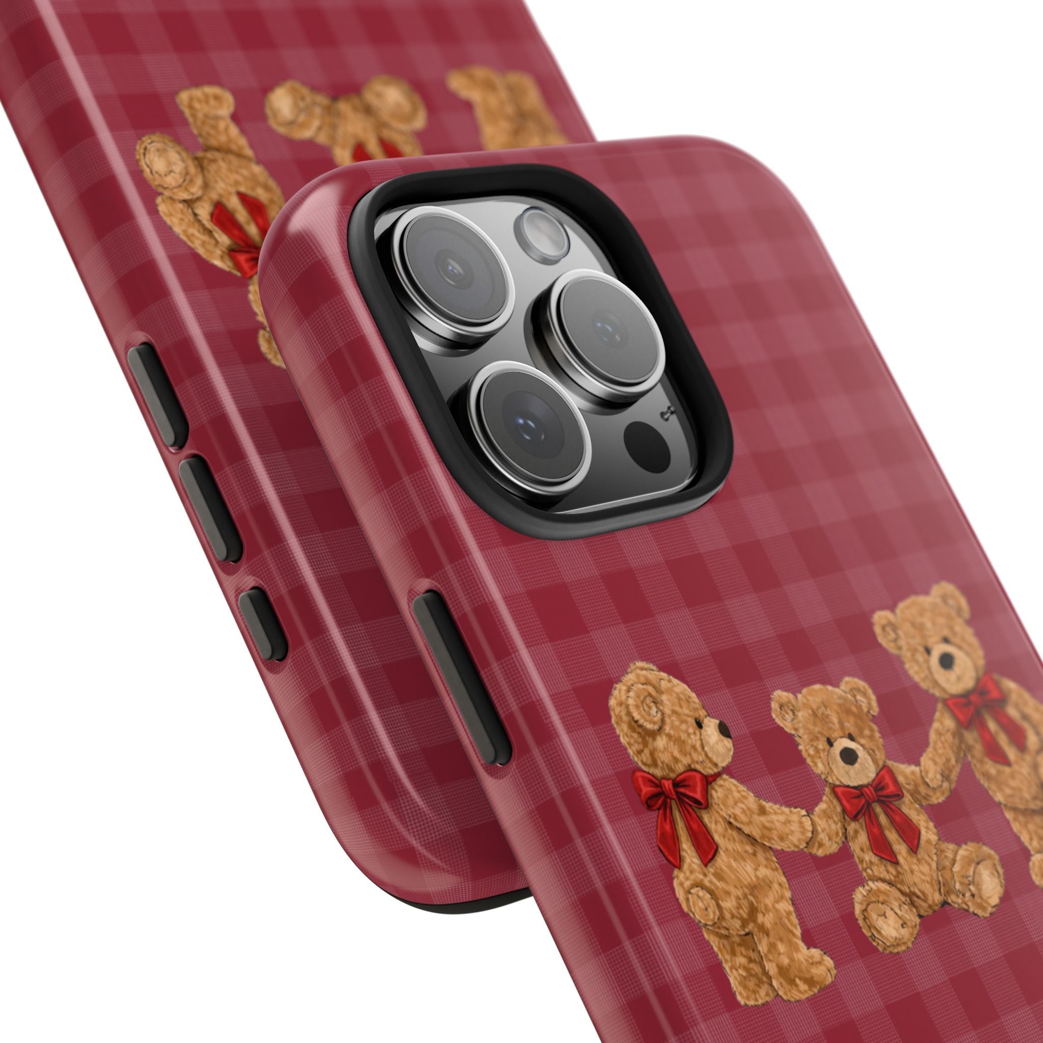 Angled red plaid phone case showing teddy bear design and side button cutouts