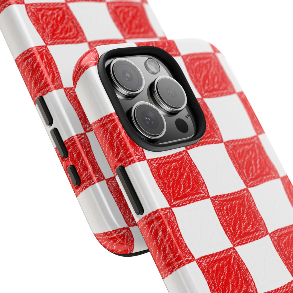 Red checkered phone case close-up with textured pattern and side button openings