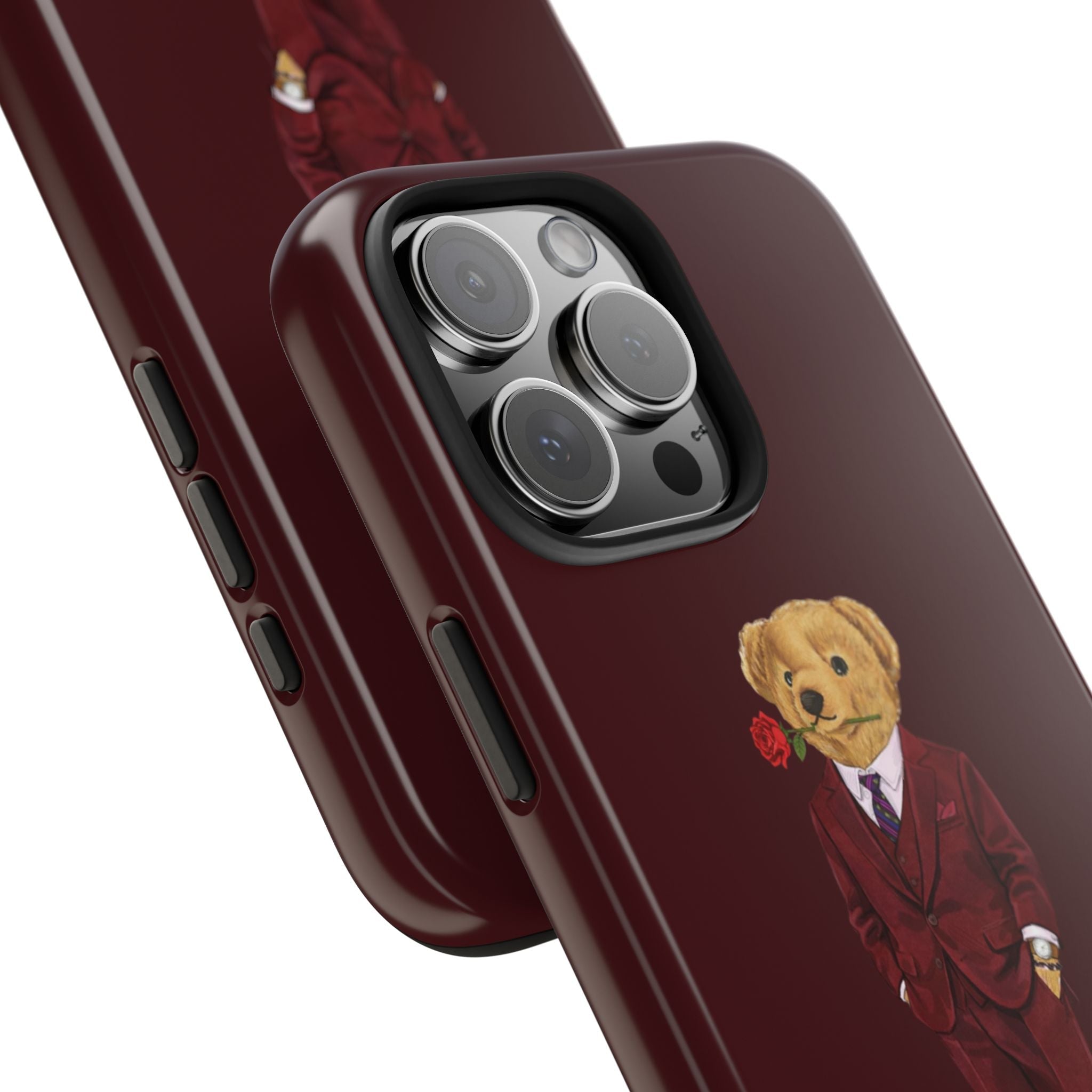 Side view maroon phone case with teddy bear in suit graphic and camera cutouts