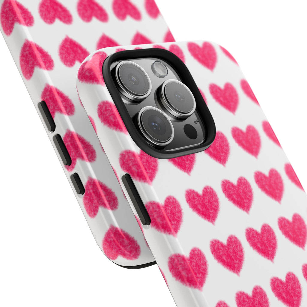 Pink hearts phone case with raised camera area and black bezel around lens cutouts