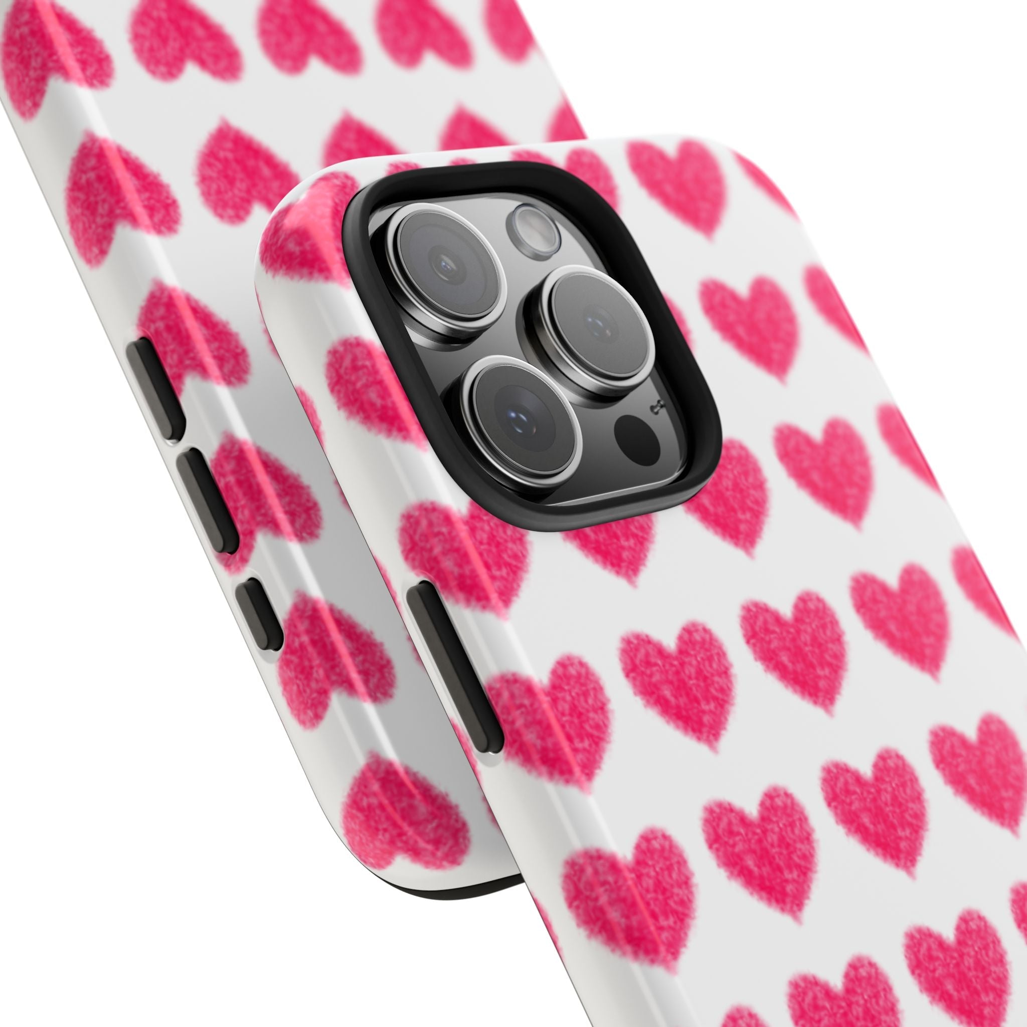 Pink hearts phone case with raised camera area and black bezel around lens cutouts