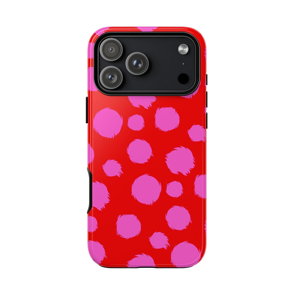 Back of red phone case with pink cheetah dots, camera lenses and flash openings