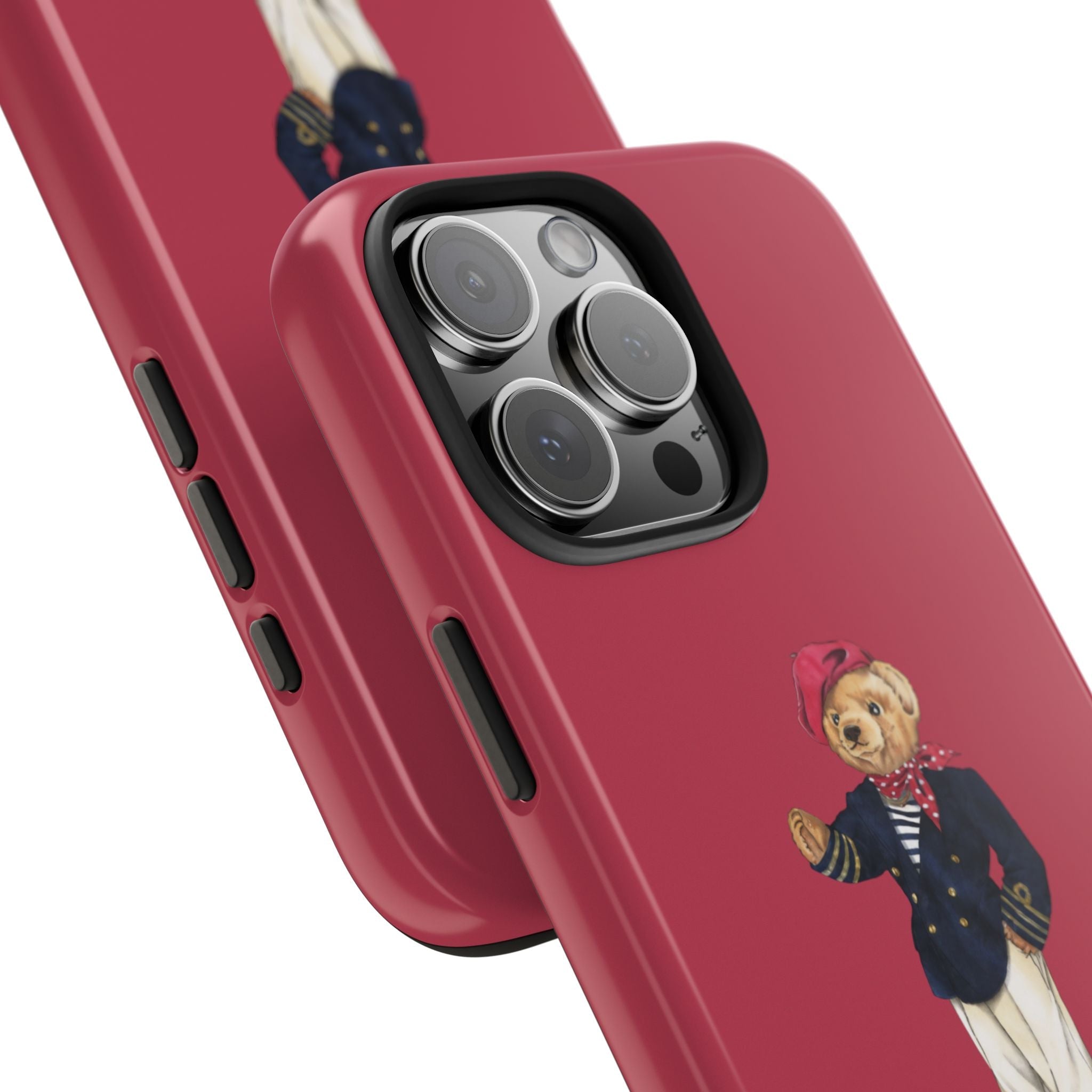 Red case detail: side buttons and camera lens covers, teddy bear graphic on lower back