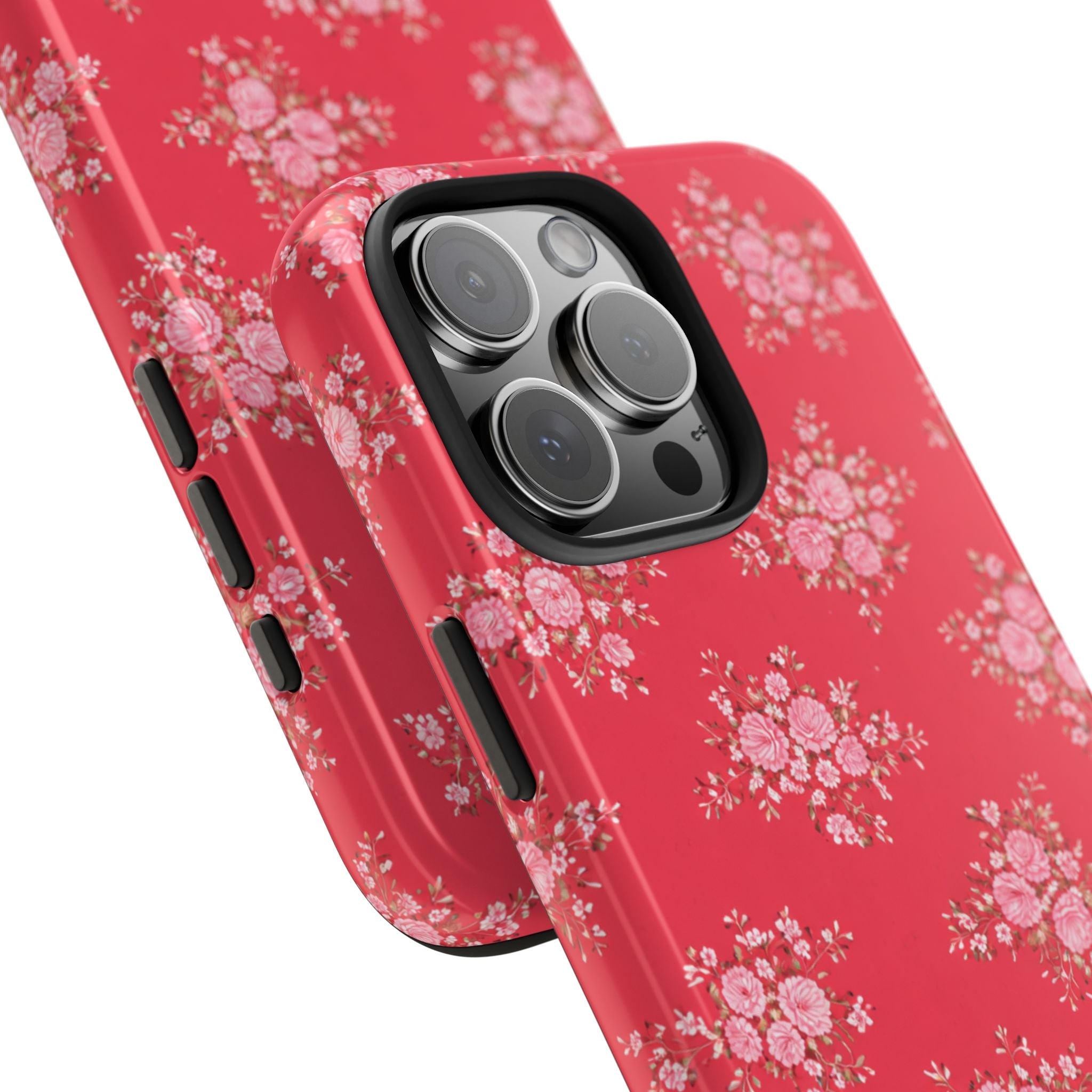 Red floral phone case angled view showing side buttons and camera lens area