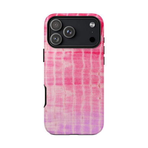 Back view of red shibori tie-dye phone case with magenta-to-purple grid swirls