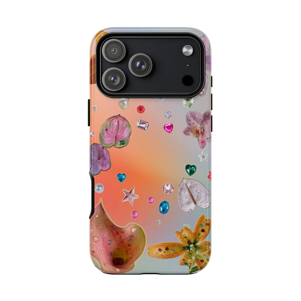 Rhinestone floral phone case design with pink flowers, gems, and heart shapes