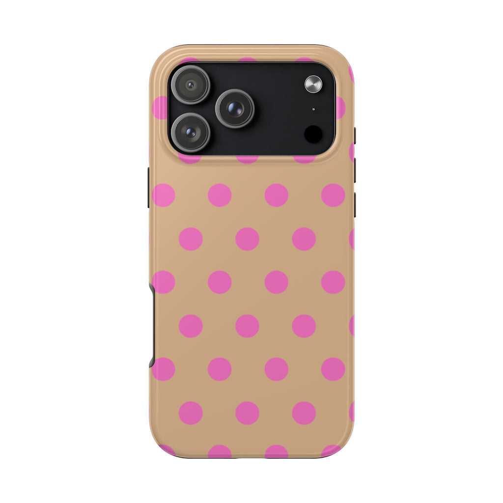 Rose beige phone case with bright pink polka dots, camera cutout and side buttons