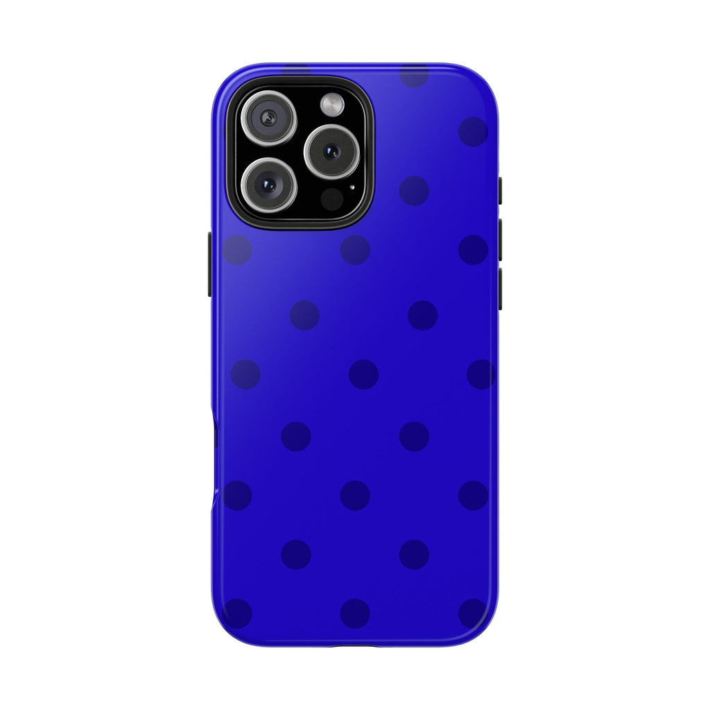 Royal blue phone case with dark polka dots, glossy finish, rear camera cutouts