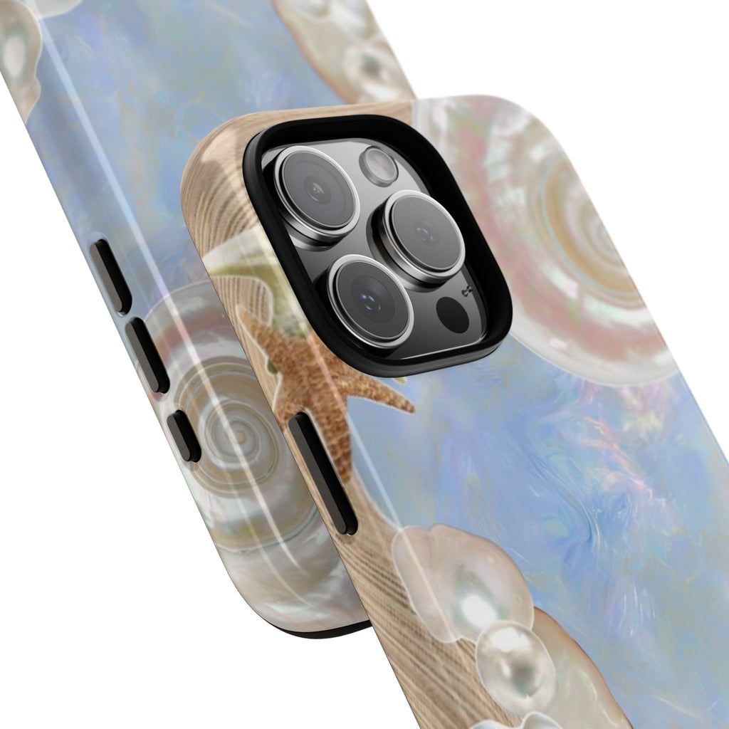Sea shell phone case angled view showing opal blue, pearls, and sand-beige edge