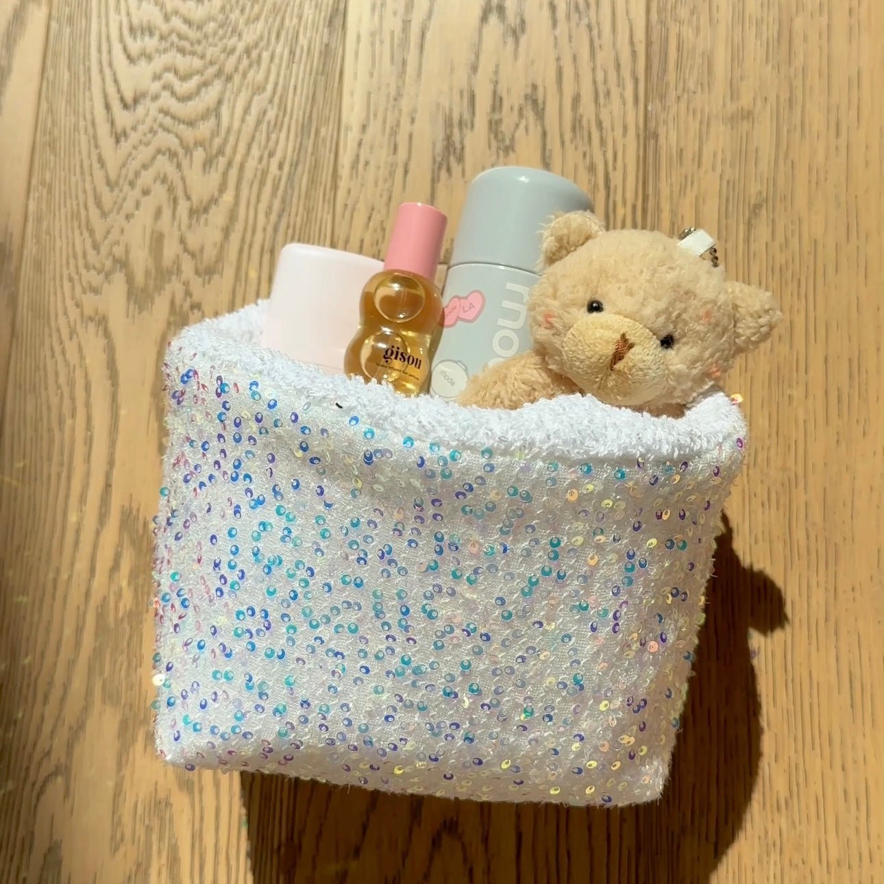 Silver sequin organizer pouch, shimmering light blue with rainbow sparkle pattern and zipper