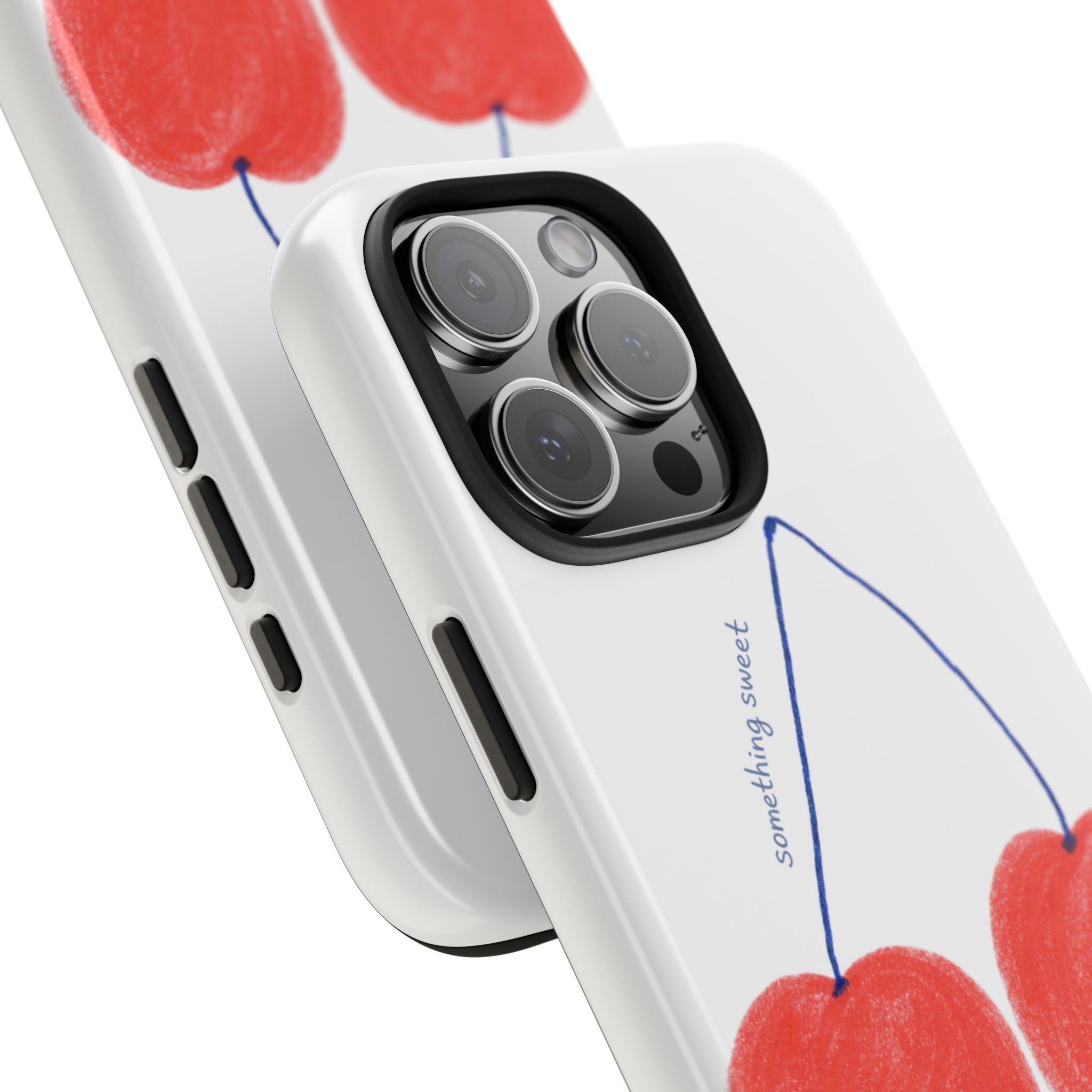 Close-up white phone case with red cherry graphic, blue lines, and camera cutout