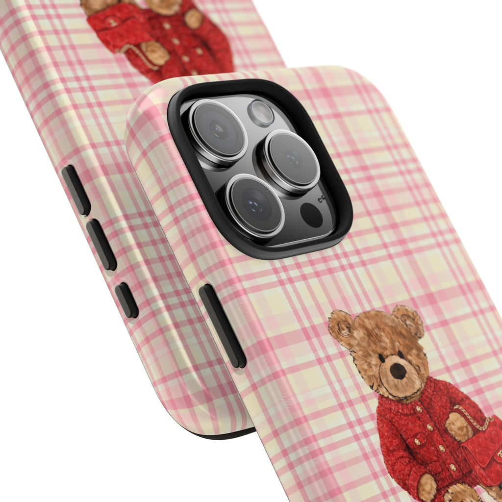 Plaid phone case with tan teddy bear detail and side cutouts near camera lenses