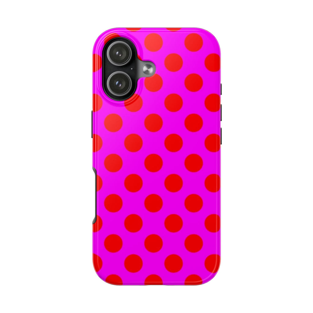 Pink phone case with red polka dots and camera cutouts, glossy protective frame