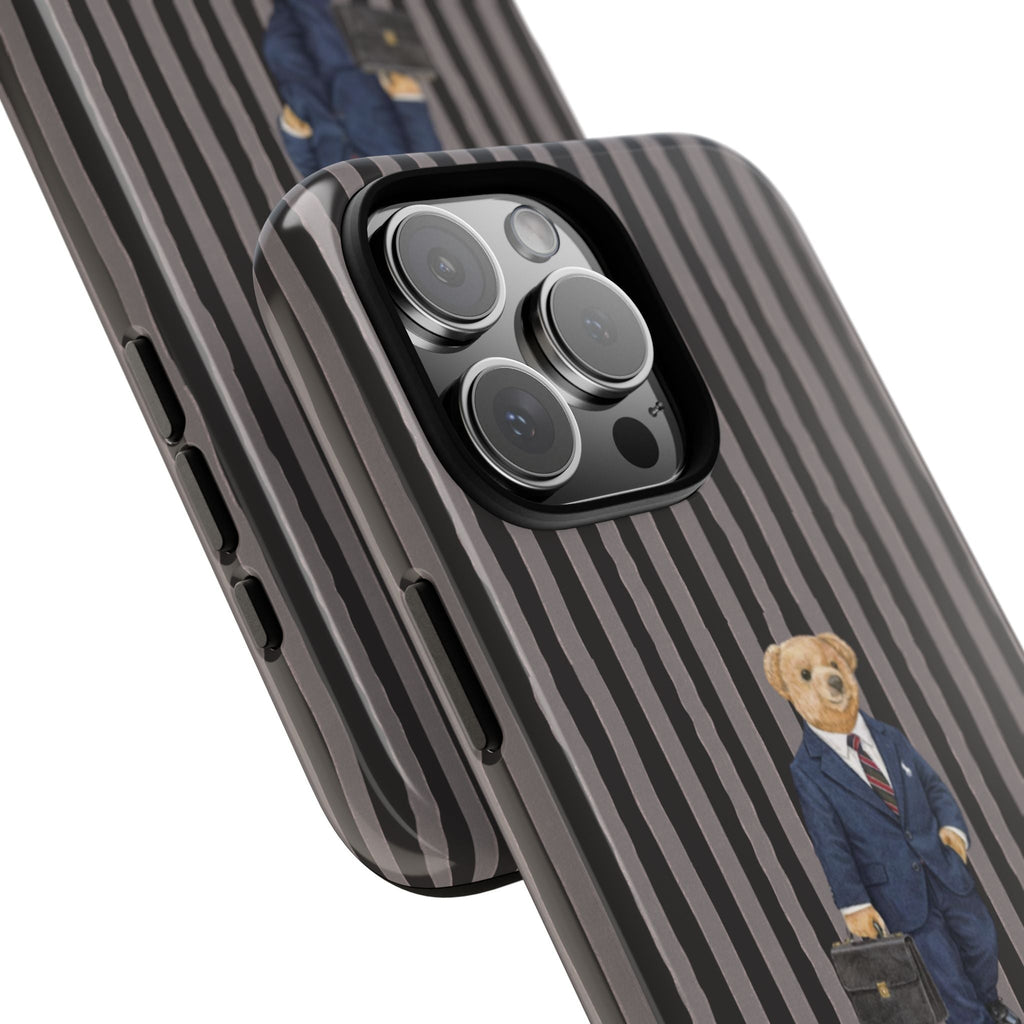Side close-up of striped phone case with teddy bear figure by camera cutout