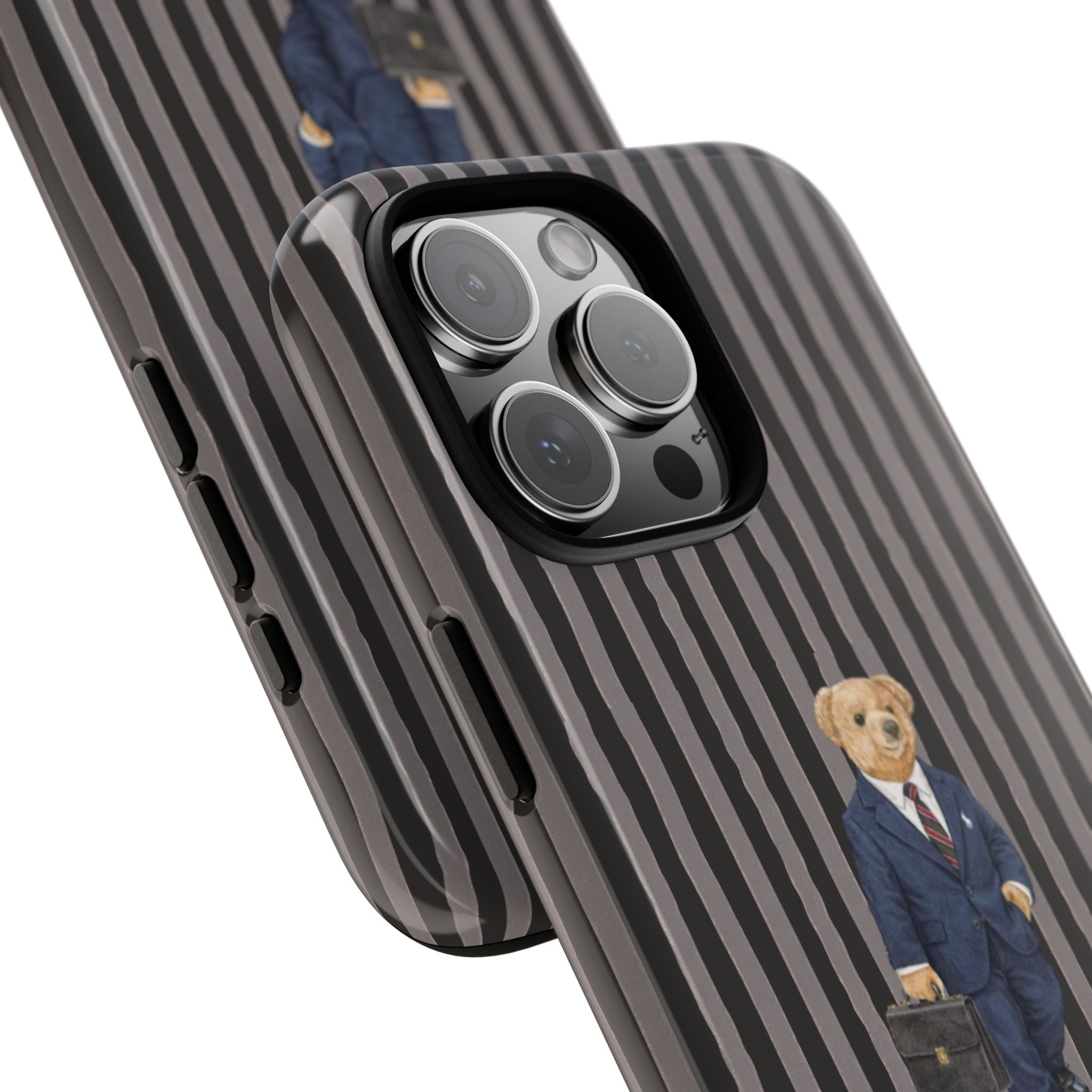 Side close-up of striped phone case with teddy bear figure by camera cutout