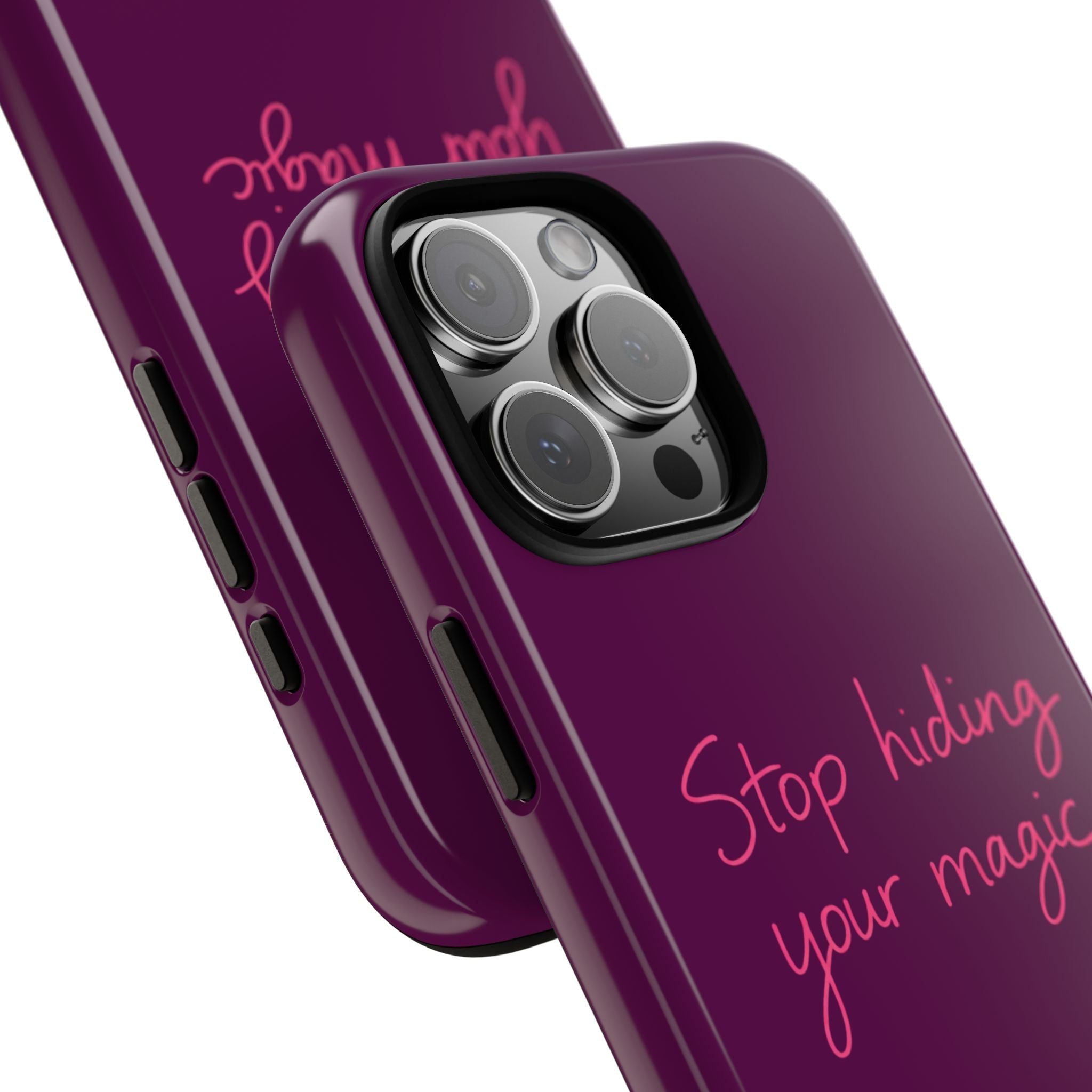 Angled purple phone case with pink “Stop hiding your magic” text and raised camera rings