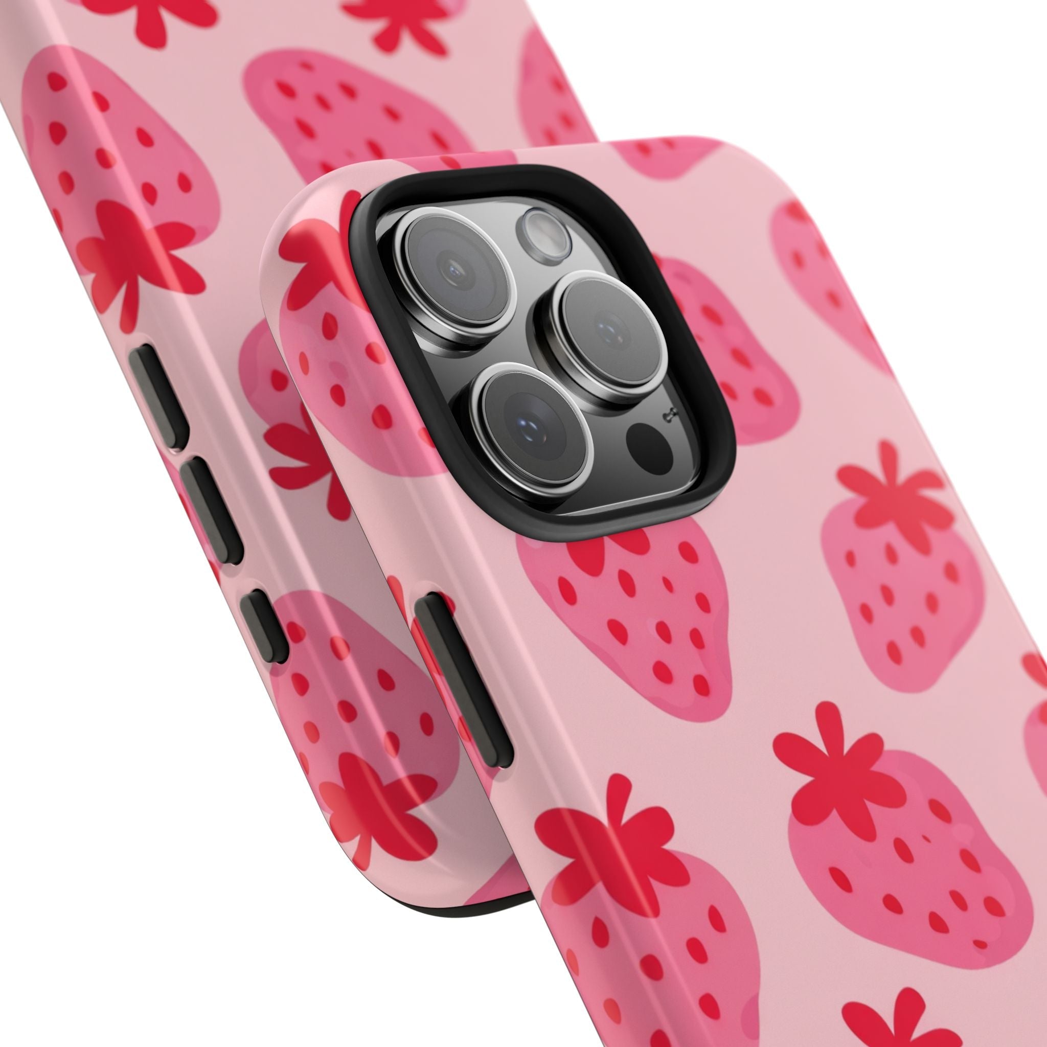 Strawberries phone case close-up, glossy pink with red strawberries and camera lenses