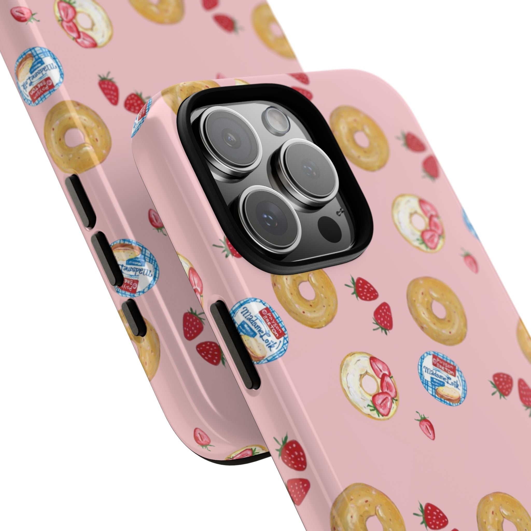 Angled pink phone case with strawberry-bagel print and camera lens protection ring
