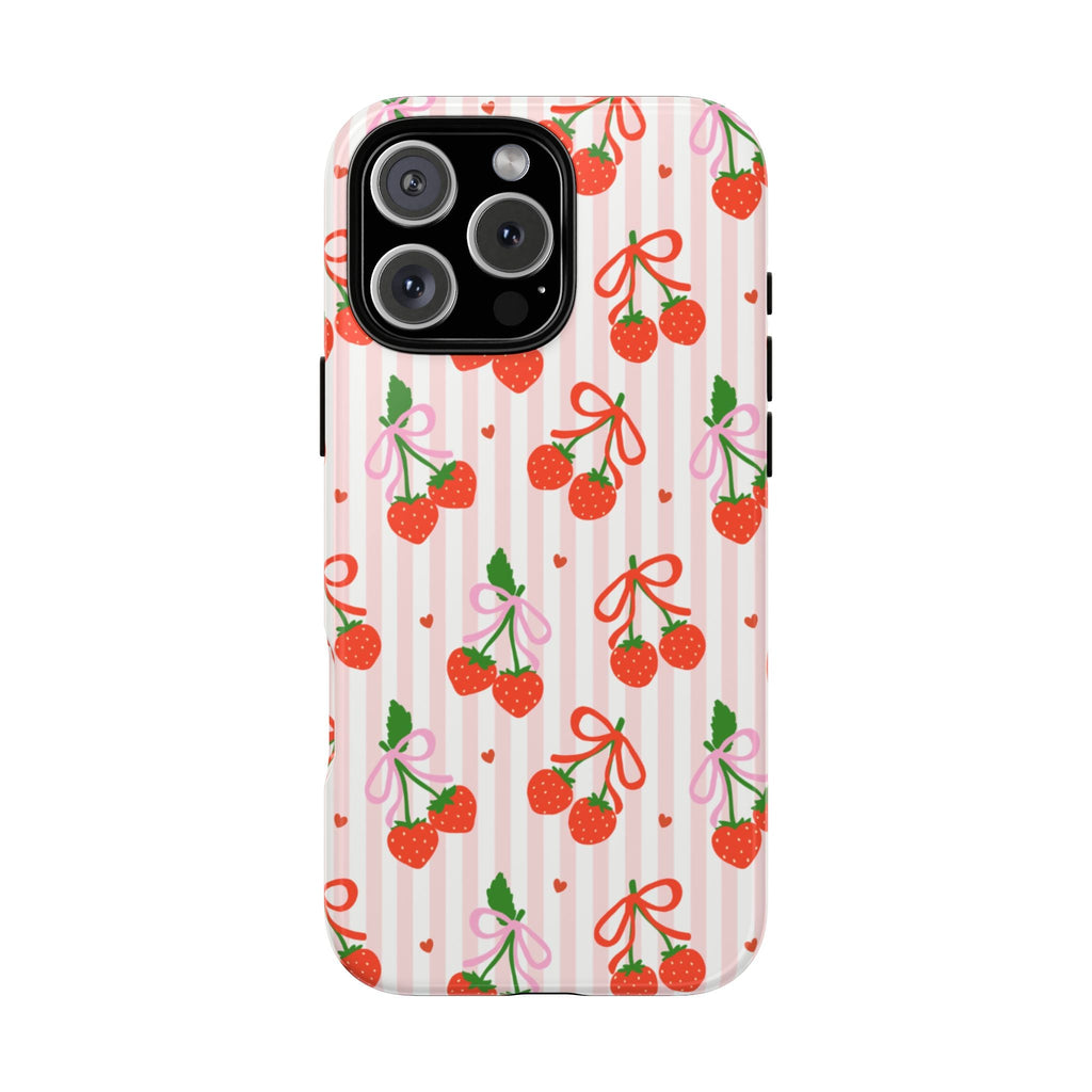 Phone case with pink vertical stripes and scattered strawberry bows pattern